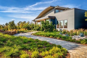 Exterior view of winery tasting room from the driveway entrance Pura NFC by Trespa Lumen New York Grey Photos Courtesy of @paulkozal