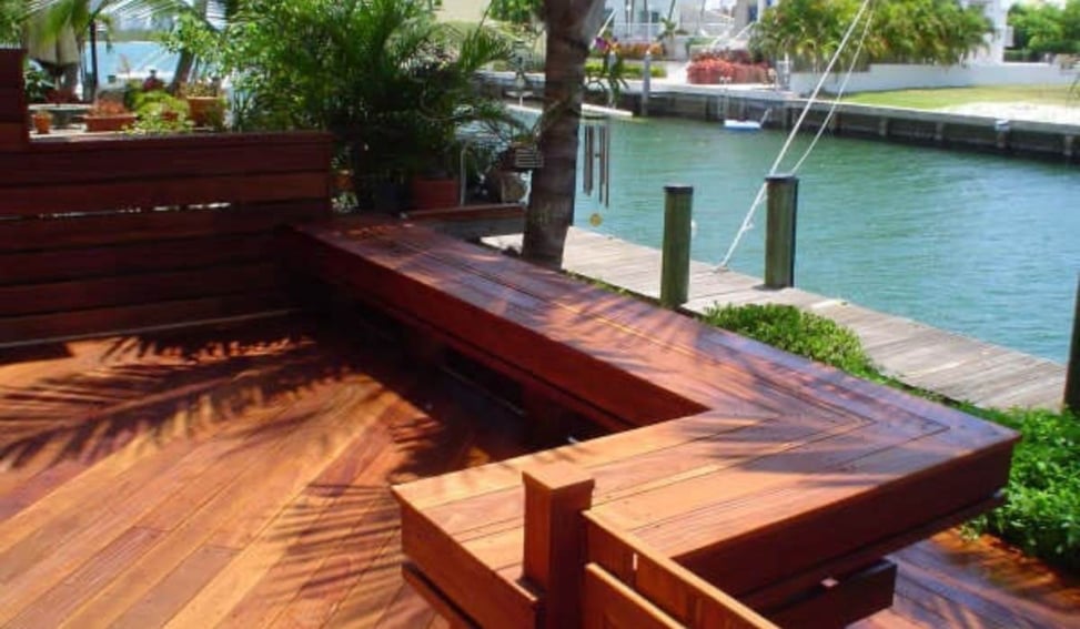 cumaru wood deck with built in seating on waterfront