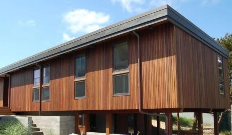 Ipe vertical wood rainscreen with Climate-Shield CS2 system