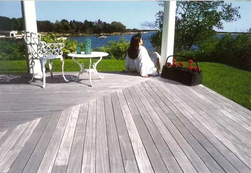 Ipe wood deck shown weathered to a silver-gray patina