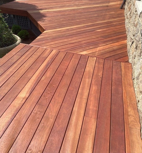 Jatoba hardwood decking contrasted with stone exterior