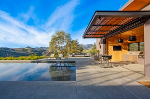 Outdoor kitchen with ThermaWood FR fire treated ceilings and soffits and exterior vertical siding