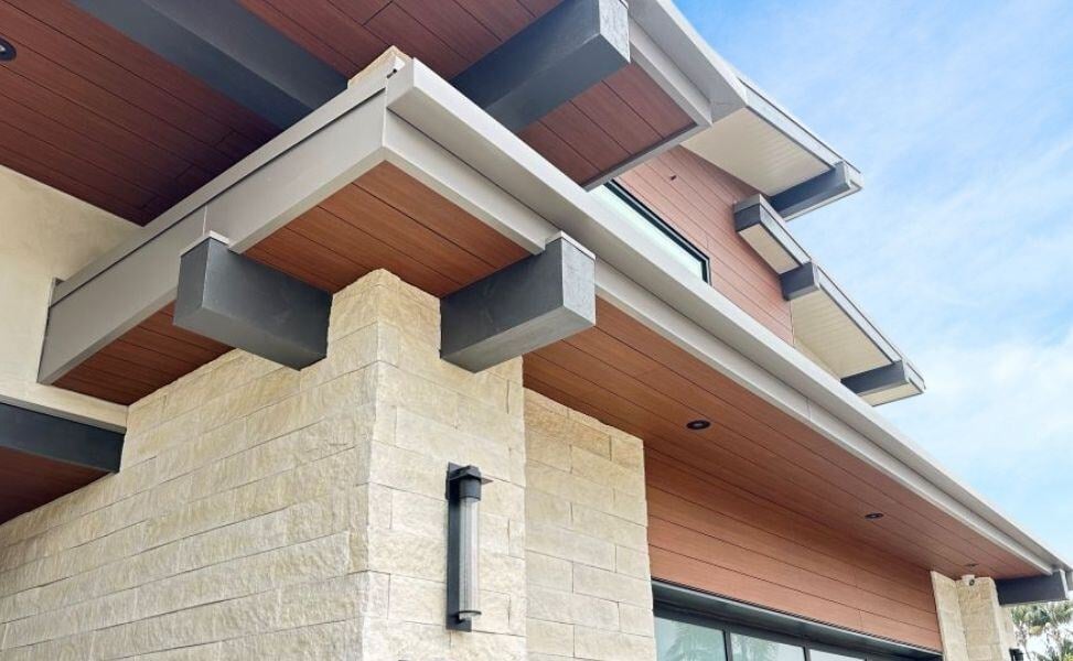 Pura NFC Tropical Ipe on siding and soffits side view entryway soffits