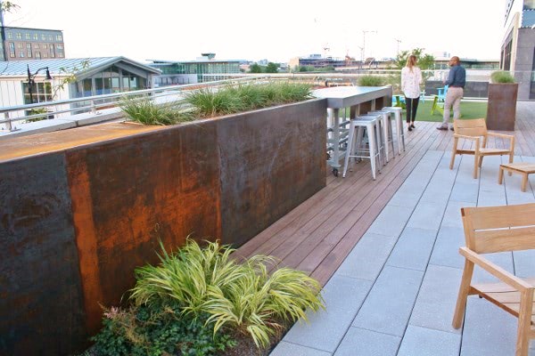 Rooftop decking, pavers, planters, turf and spectacular views