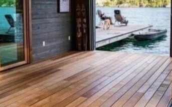 A lakefront deck made from Mataverde Thermawood Hemlock decking material.