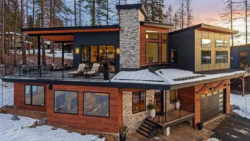 ThermaWood thermally modified wood siding and rooftop decking on a residence on ski mountain