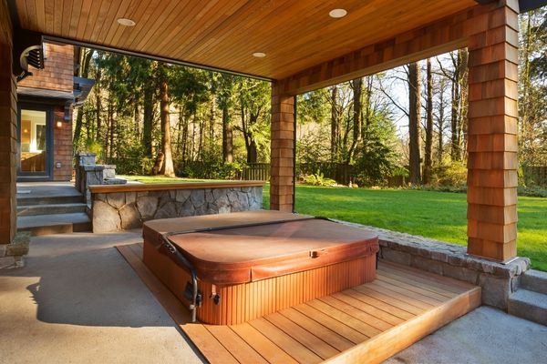 Ipe wood decking under a hot tub in a outdoor room