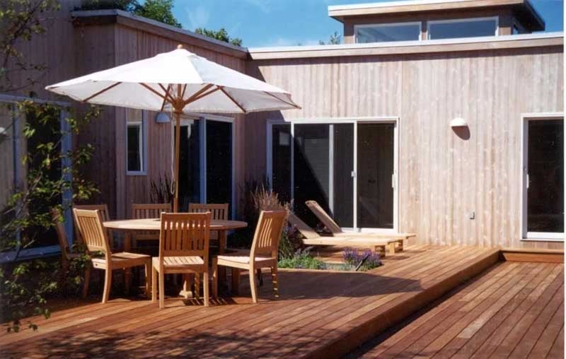 hardwood deck with multiple shallow levels and a sunken garden area to separate different areas