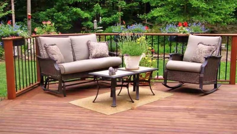 ipe wood backyard deck with wood railing