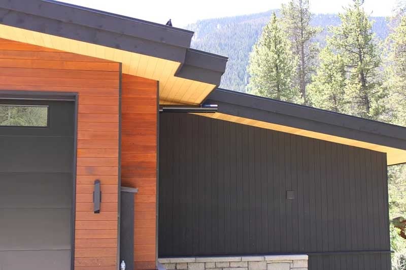 thermally modified hemlock siding and soffits all stained differnt shades-1