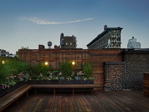 Wood rooftop deck with Eurotec system vs sleepers