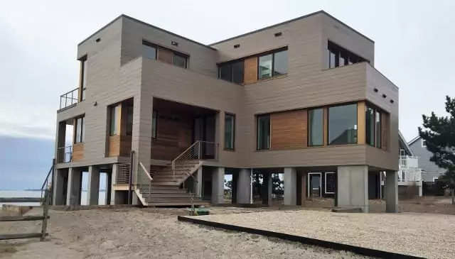 cedar siding installed with Climate-Shield rainscreen system on the ocean