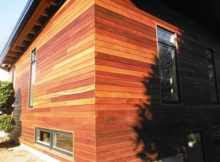 Cumaru wood siding installed with Climate-Shield Rainscreen System